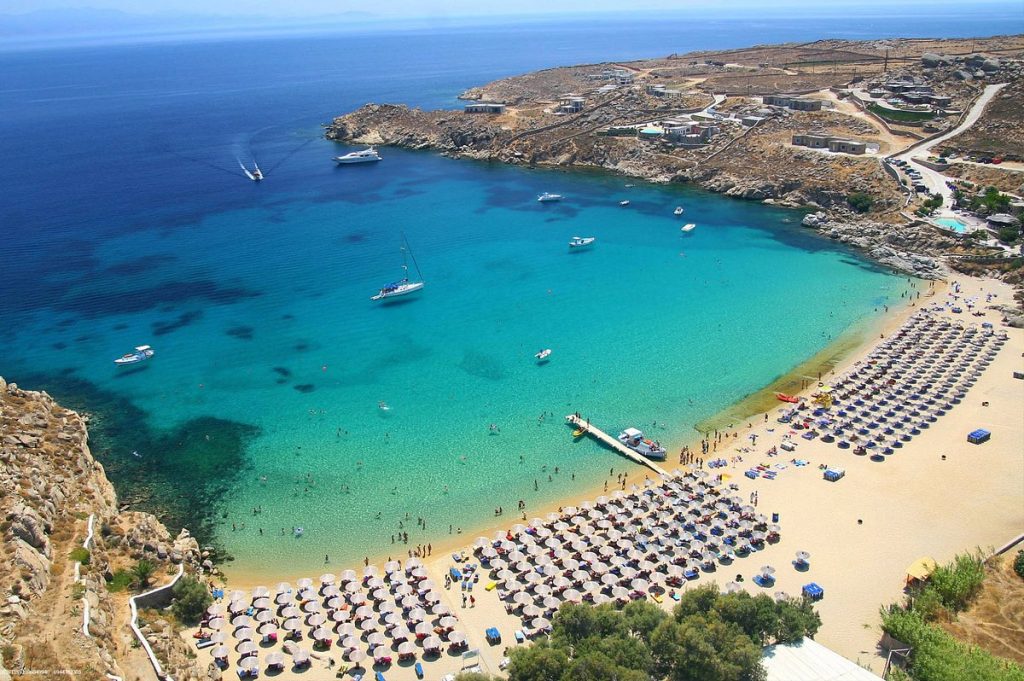 hire luxury driver to super paradise beach mykonos